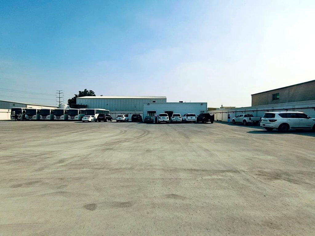 RANCO's yard with buses, excavators and workshop buildings